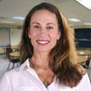 Stephanie Bragg Smiling woman with long brown hair
